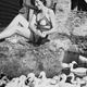 Woman feeding ducks